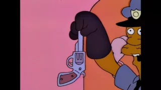 Regarde ce que j'ai trouvé sous le siège de M. Simpson.
