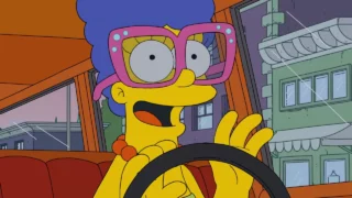 Marge portant des lunettes dans le style d'Elton John.