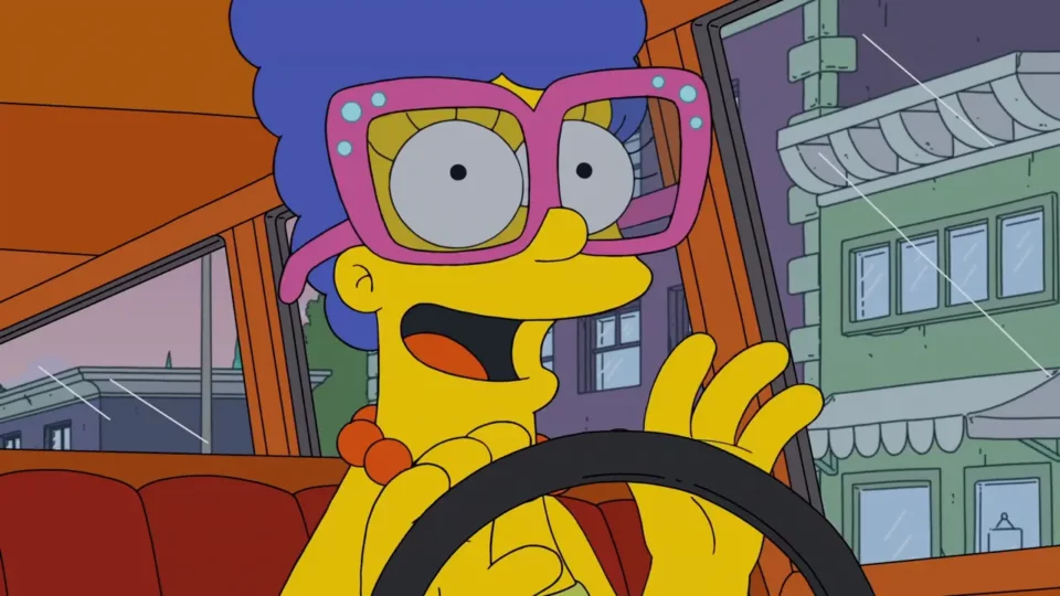 Marge portant des lunettes dans le style d'Elton John.